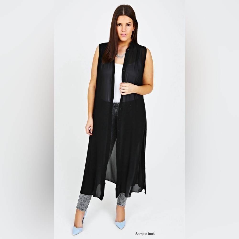 Thalia Sofi - Sleeveless, high neck, solid, black, about knee length.
